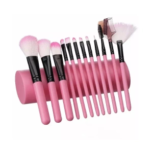 A SET OF 12 MAKEUP BRUSHES IN A TUBE